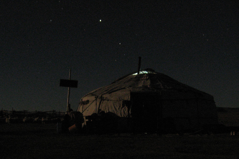 Solar-powered yurt at night