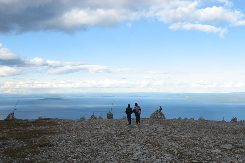 Ovoos on the summit of Mt. Chuchu, Hövsgöl nuur in the background